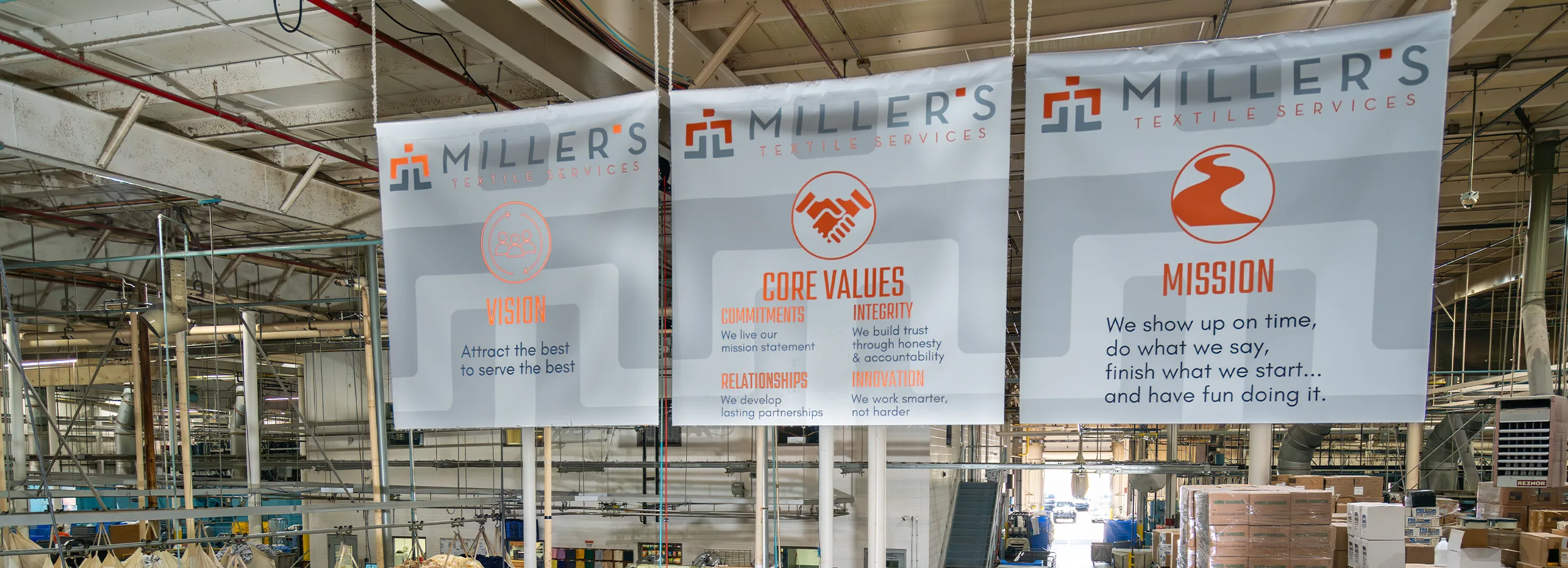 Vision, Core Values, and Mission signs in Miller's warehouse