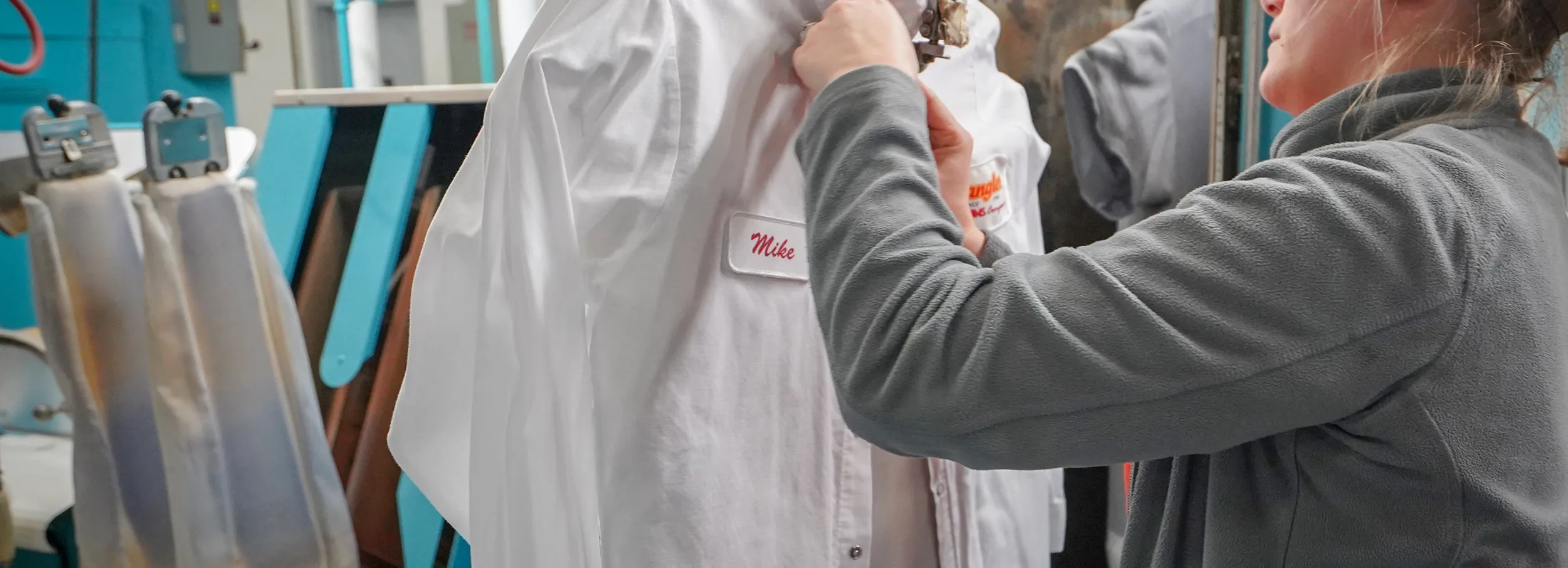 Personalized uniform being inspected