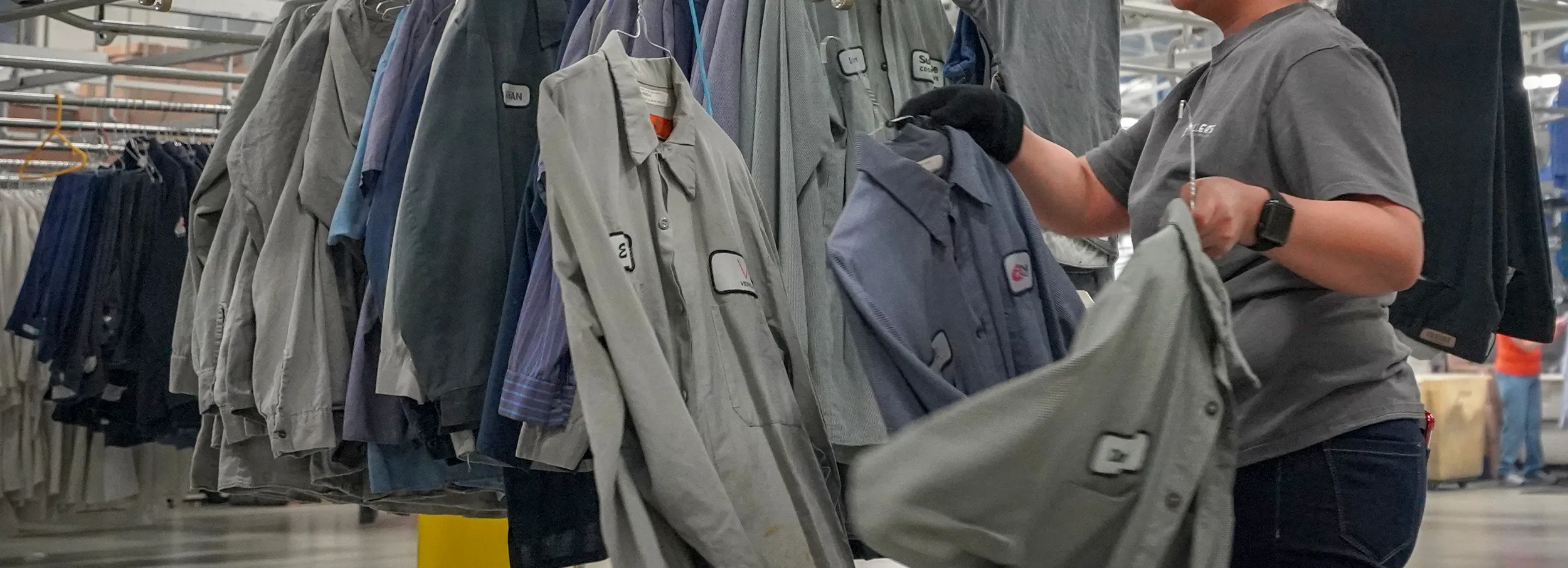 Personalized uniforms on hangers